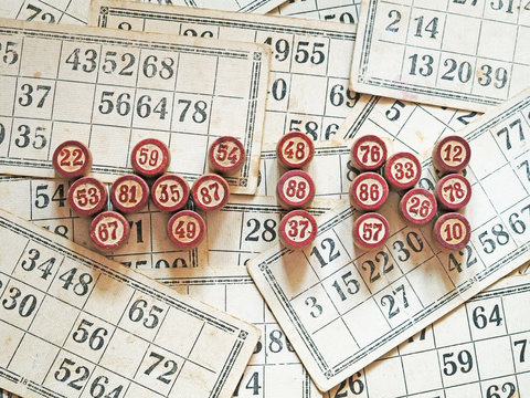 Tabletop old lotto game with wooden elements. Cards bingo. Keywords win