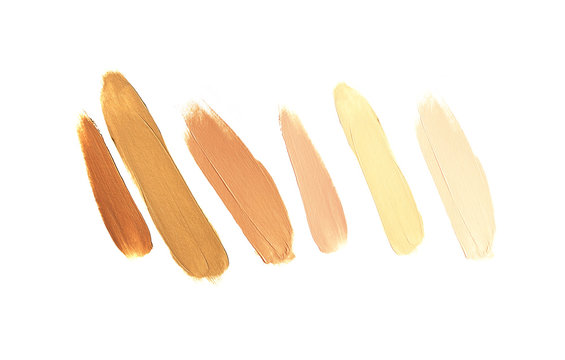Collection of make up liquid foundation strokes on white