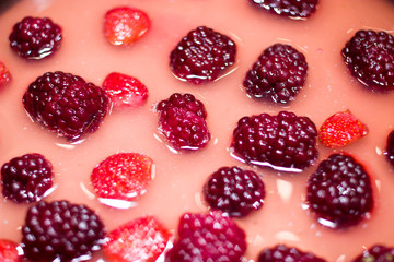 Cooking berry cheesecake.