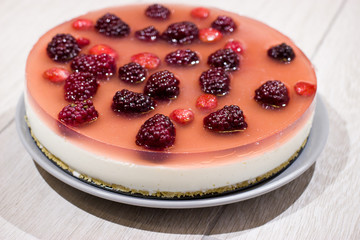 Cooking berry cheesecake.