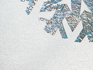 foil snowflake on a silver background