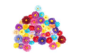Small, colorful paper flowers made with quilling technique