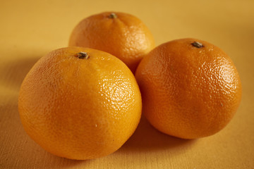 fresh whole unpeeled clementines