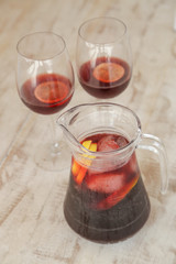 Pitcher of sangria with two glasses