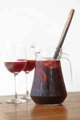 Pitcher of sangria with two glasses