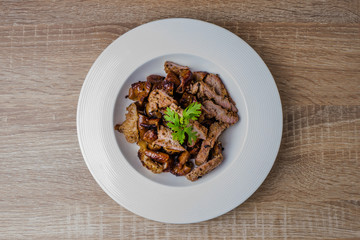 Grill pork on wooden table.  (Thai style food)
