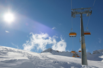 Winter mountains panorama with ski slopes and ski lifts. Zugspitze. Germany. Austria.