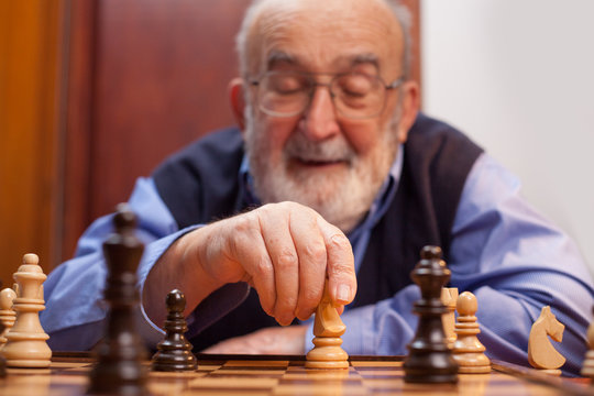 Old Man Playing Chess