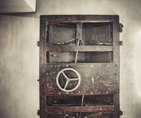 Old rusty metal door. industrial background