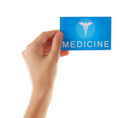 Hand holding card isolated on white