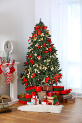 Decorated Christmas room with beautiful fir tree