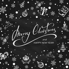 Merry Christmas with decorations on black chalkboard background