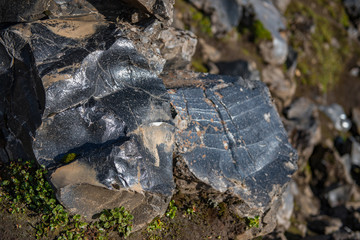 Split glassy obsidian rocks near Landmannalaugar, Iceland