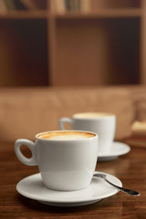 Cup of coffee on table