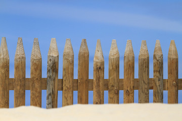 Fototapeta premium wooden fence on the beach