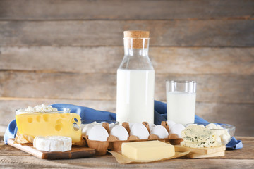 Dairy products on wooden background
