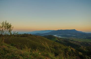 Fototapeta premium Mountain fog light morning sunrise.