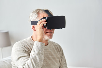 old man in virtual reality headset or 3d glasses