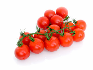 Ripe Fresh Cherry Tomatoes on Branch Isolated on White Background