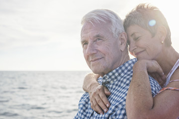 Affectionate couple by the sea