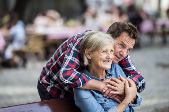 Senior couple watching something