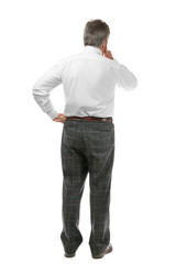 Fototapeta premium Senior businessman standing back on white background