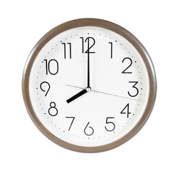 Brown wall clock isolated on white background.Wall clock at eigh
