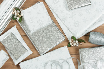 Group Of Wrapped Christmas Gifts, Silver Wrapping Paper, Decorat