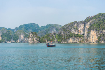 Fototapeta na wymiar Fishing boat on Halong bay, Vietnam