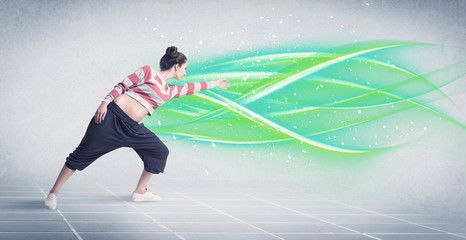 Hip hop dancer posing with green lines