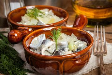 Tasty herring in pieces.