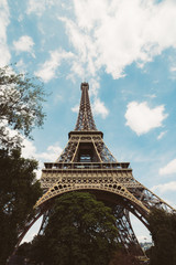 Eiffel Tower. Paris. France. Famous historical landmark on the quay of a river Seine. Romantic, tourist, architecture symbol.