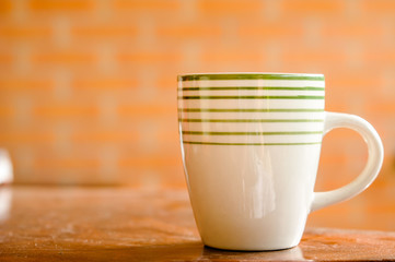 Cup of coffee on a wooden table