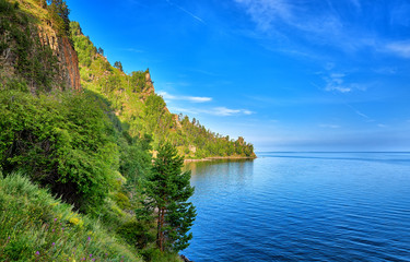 Blue water deep clear lake summer day. Baikal