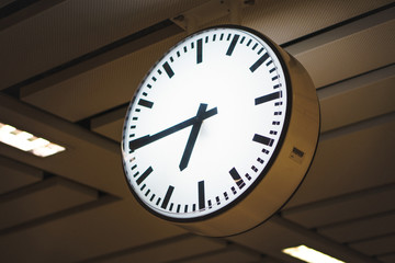 Clock in train station in Bangkok, Thailand.