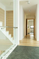Fototapeta premium Wooden corridor with stairs