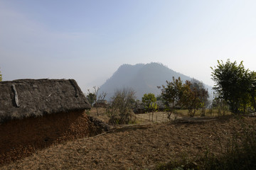 Agricultural fields with village in Annapurna area, Nepal.