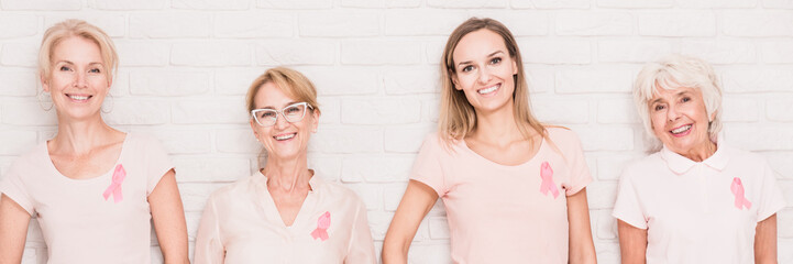 Women at brick wall