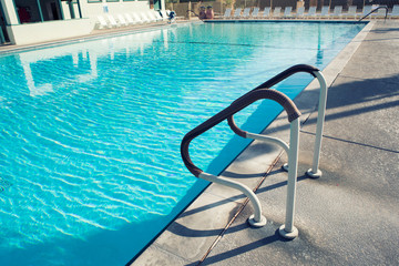 Grab bars ladder in the swimming pool.