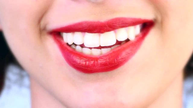 close-up of a woman's mouth that speaks quickly 