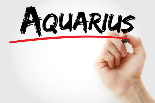 Hand writing Aquarius with marker, concept background