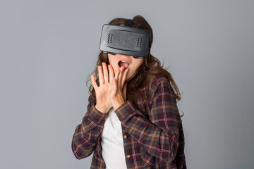 happy woman in virtual reality helmet