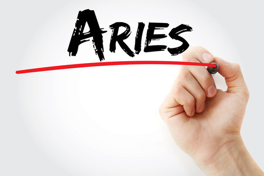 Hand writing Aries with marker, concept background