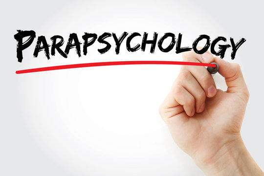 Hand writing Parapsychology with marker, concept background
