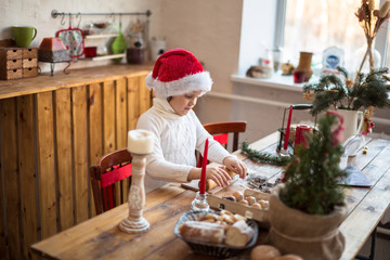 funny child girl preparing cookies, lifestyle, real nordic inter