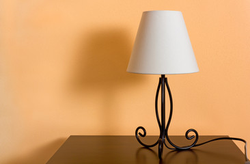 Classic Lamp on a Wooden Bedside Table