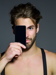Handsome man with smartphone