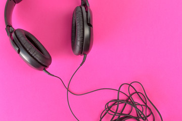 headphones on pink background