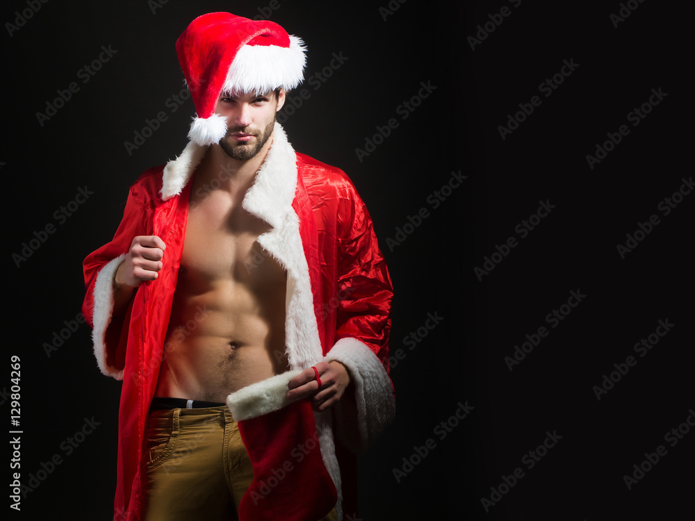 Poster handsome muscular christmas santa man