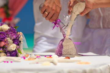 Obraz na płótnie Canvas ceremony colored sand